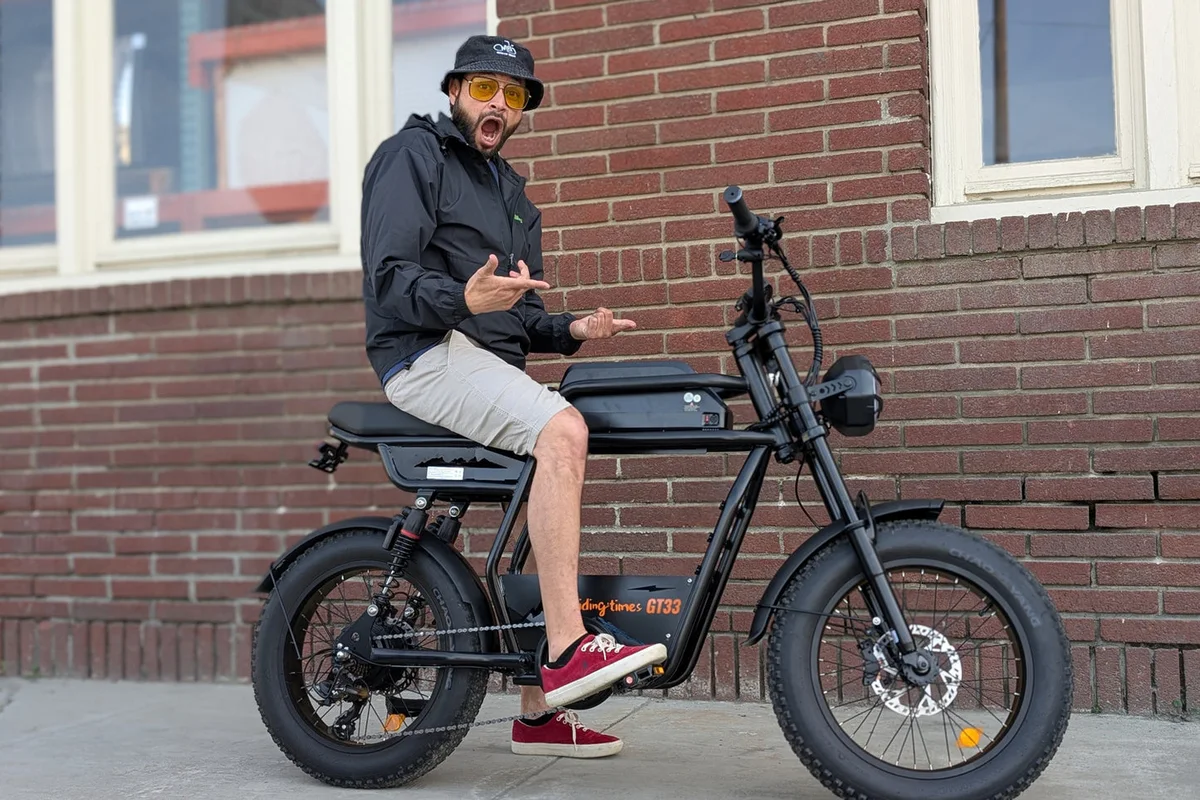 Rider seated on a black Riding Times GT33 cargo electric bike